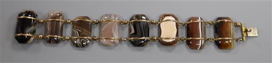 A Victorian gilt metal and banded agate set bracelet, 17cm.